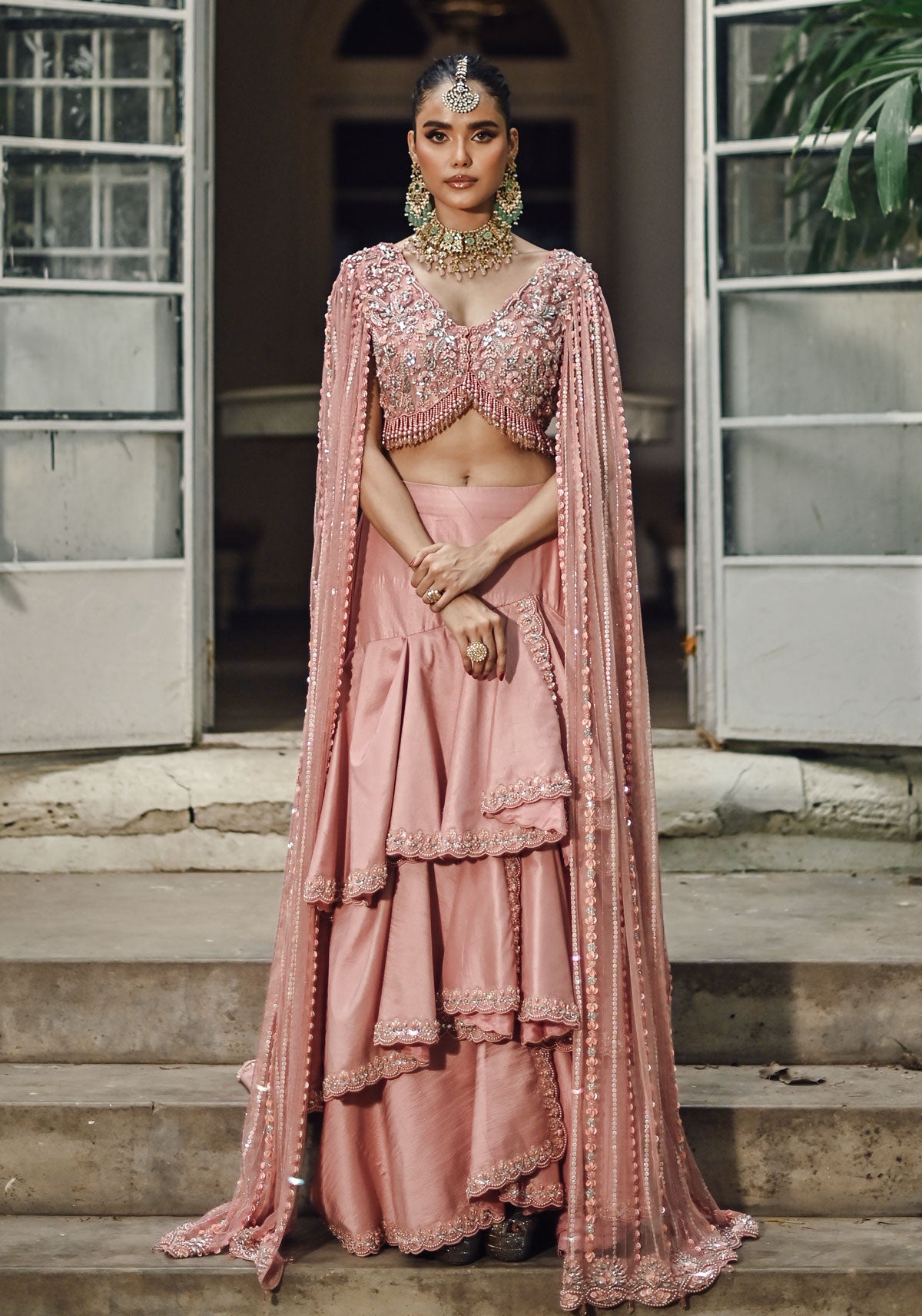 Pink Embellished Choli with Ruffled Skirt and Net Dupatta